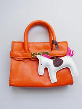 Load image into Gallery viewer, Girl&#39;s Orange Faux Leather Satchel Handbag with a Horse Charm
